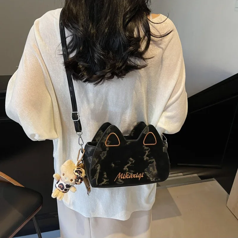 2025 new Sanrio cute foreign versatile fashion trend high sense cat ear bag cartoon Hello Kitty doll shoulder messenger bag