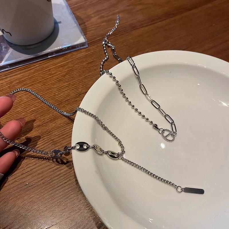 سترة من النوع الثقيل ذات سلسلة شرابة فاخرة وخفيفة الوزن بتصميم نسائي وإكسسوارات سلسلة الترقوة بمزاج بسيط