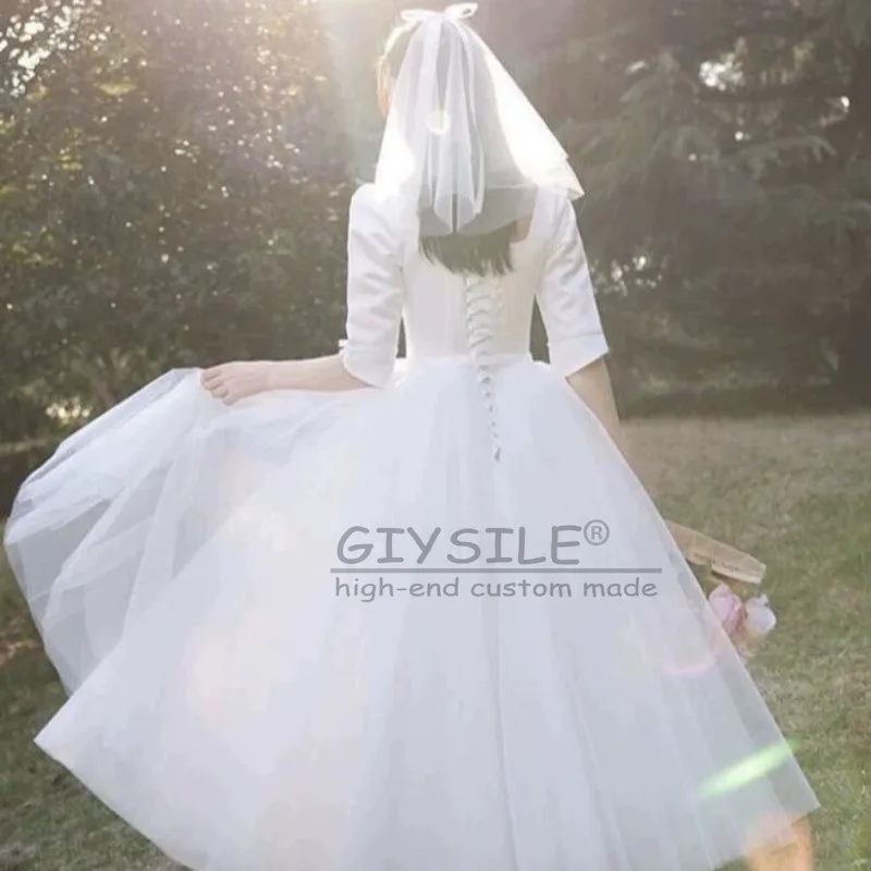ชุดแต่งงานสีขาวแบบสั่งตัดของ GIYSILE ปี 2026 คอเหลี่ยมสไตล์เฮปเบิร์น สายรัดหลังแบบแฟชั่น กระโปรงฟูฟ่องแบบเจ้าหญิง