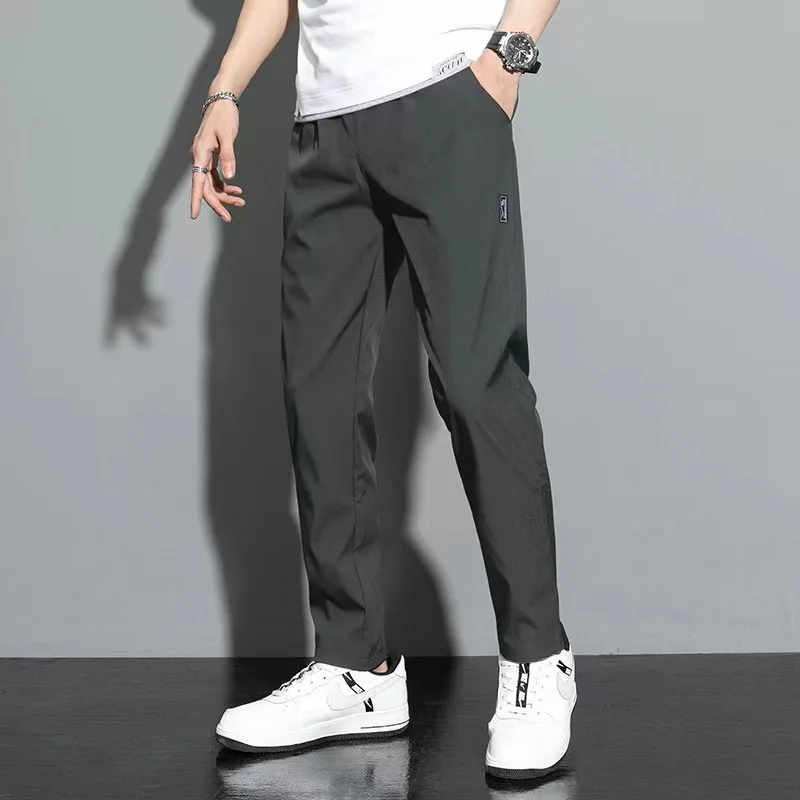 

2024 Summer Casual Pants Men's Loose Thin Ice Silk Pants Straight Leg Quick Drying Pants Breathable Men's Elastic Sports Pants
