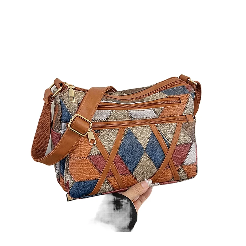 

Multi layer large capacity middle-aged mother bag for women 2024 new fashionable soft leather splicing single shoulder women's b