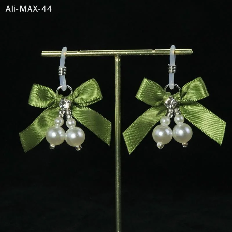 Pink Adjustable Metal Nipple Clamps with Soft Non-Slip Pads Bow Pearl Rhinestone Decor for Couples Intimate Bedroom Play view 3