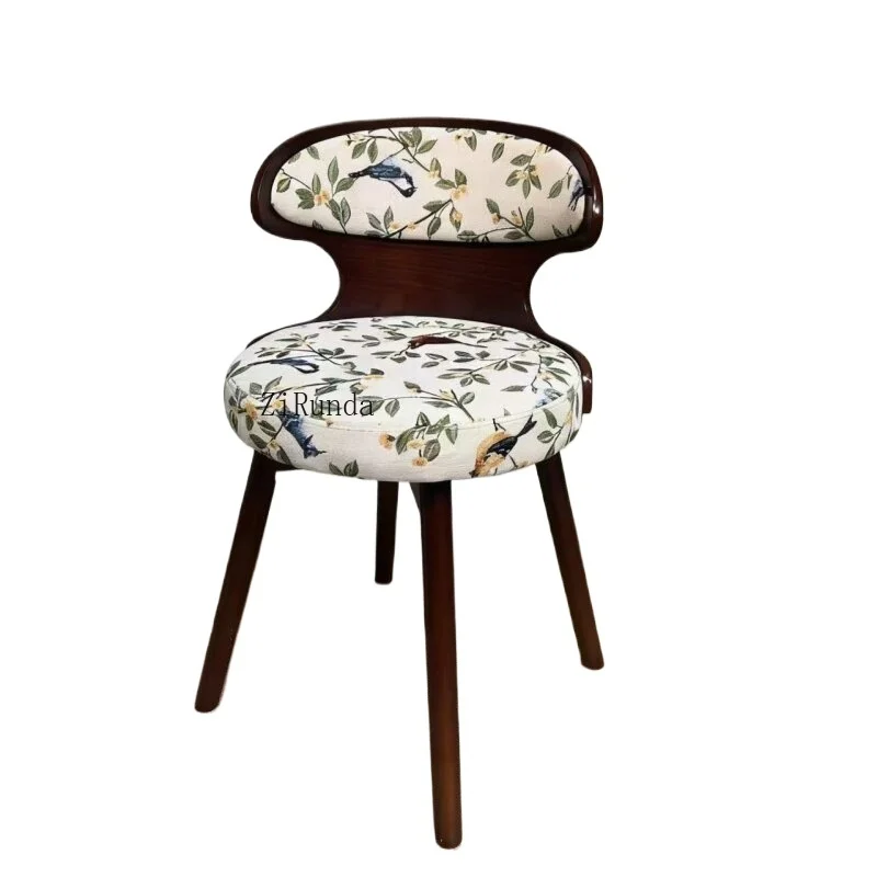 Solid wood French minimalist modern dining chair with rotating backrest, beech legs, fabric interior
