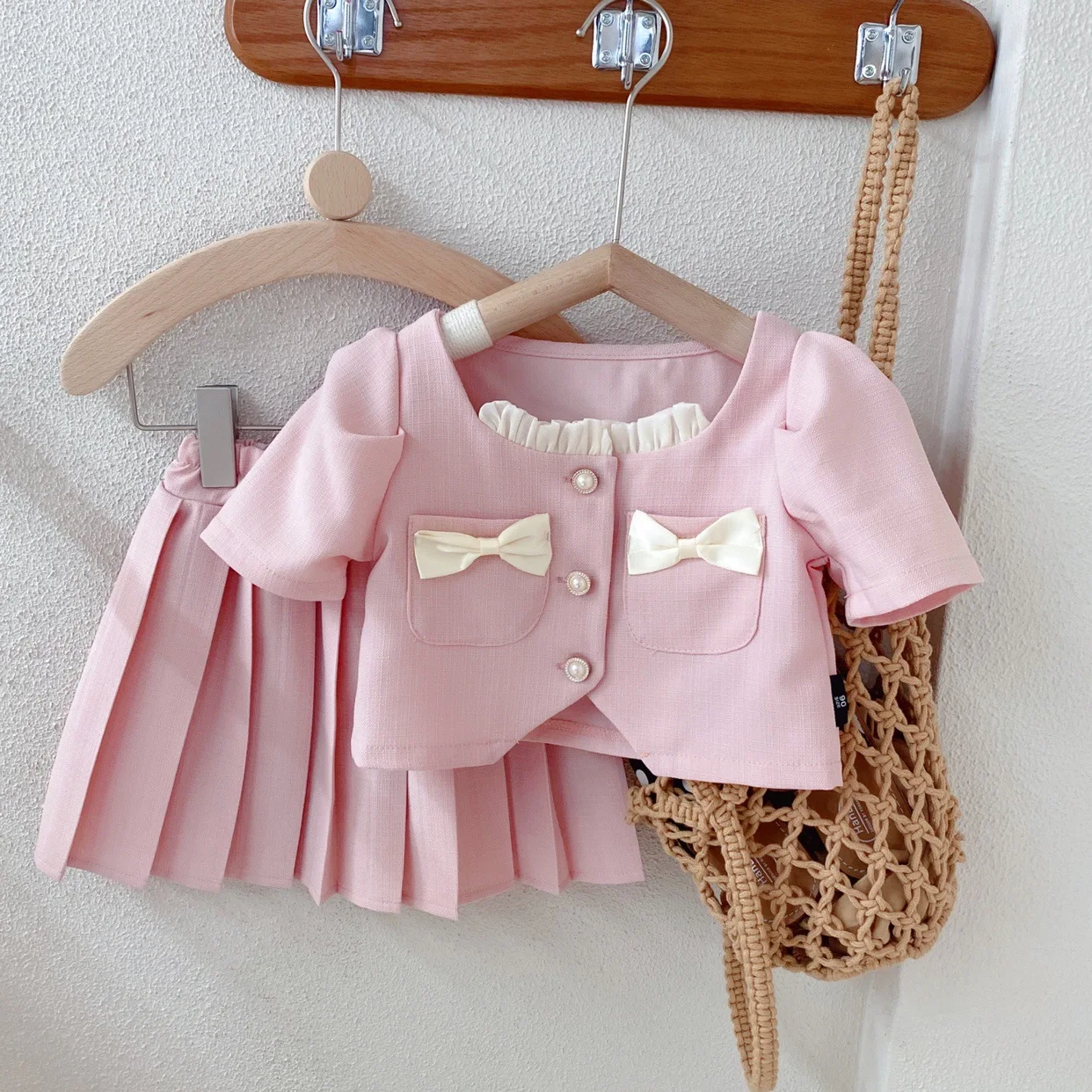 

Spring Summer New Girls' Clothing Sets Pocket Ruffled Bow Short Sleeve+Pleated Skirt 2pcs Fashion Kids Outfit Personalized Suit