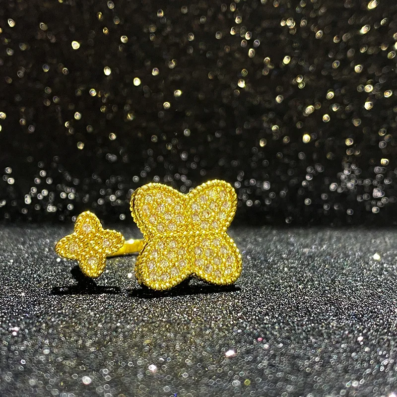 مجموعة MDL مع خاتم الماس الصغير المكسور بأربع أوراق زهرة البرسيم أوروبا والولايات المتحدة مليئة بحلقة الزركونيوم