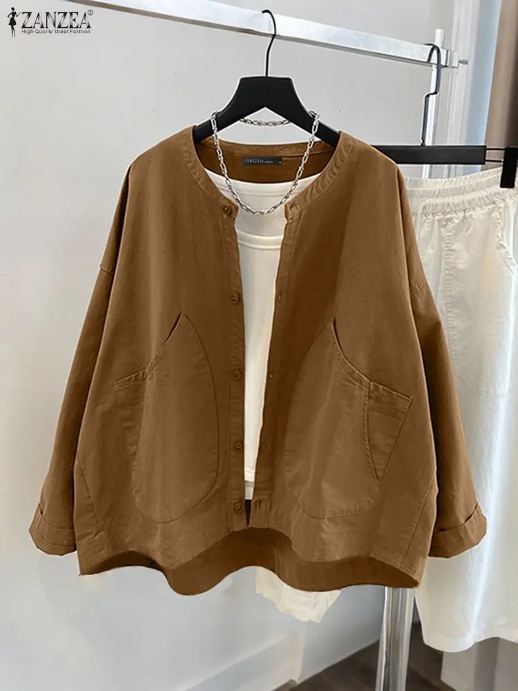 

Женские рубашки размера плюс 5XL ZANZEA, модный кардиган с круглым вырезом 2025, однотонные топы с длинными рукавами и пуговицами, повседневные блузки с карманами, большие размеры