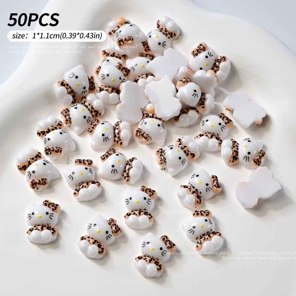 50 Teile/beutel 3D Sanrio Leopard Hallo Kitty Nail art Charms 10*11mm Nette Leopard Bowknot Kitty Nagel Dekor japanische & Koreanische KT Teile