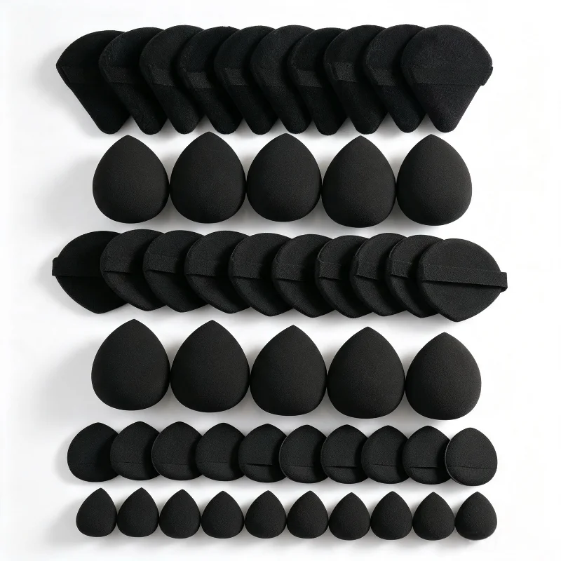 This 50-piece makeup puff set includes regular & mini liquid beauty sponges, triangular setting powder puffs, as well as regular