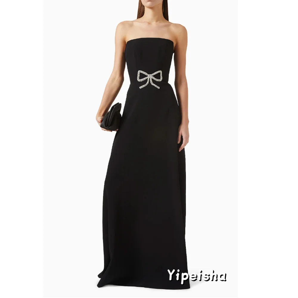 Op maat gemaakte Sparkle Jersey Plooi Strik Strass Galajurk A-lijn Mouwloze Lange Avondjurken Op maat gemaakte Gelegenheidsjurken Casual