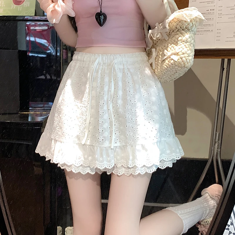 

2025 New Summer Women High Waist Slim Mini Skirt High Quality Elegant Hollow Out Embroidery Lace Hem White Safety Skirt Shorts
