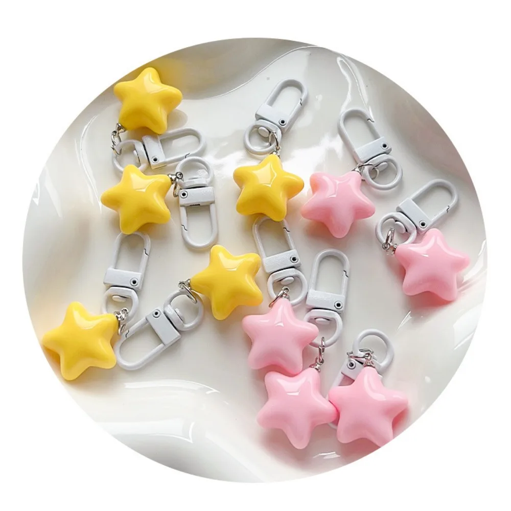 1pc bonito estrelas chaveiro para mulheres pentagrama pingente chaveiros saco da menina charme fone de ouvido caso diy acessórios casal presente