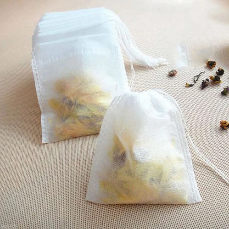 Sachets de thé en tissu non tissé, 100 pièces/lot, sacs filtrants pour thé aux épices, avec ficelle en papier pour herbe