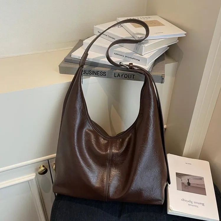 

Новая женская винтажная большая сумка 2025 года, регулируемая сумка через плечо большой емкости, шикарный слинг в стиле ретро для ежедневного использования и путешествий ​