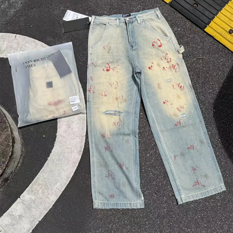 Retro American Washed Hole Woodcutting Denim Jeans Loose Straight Leg Long Trousers for Men And Women Casual Unisex Jeans