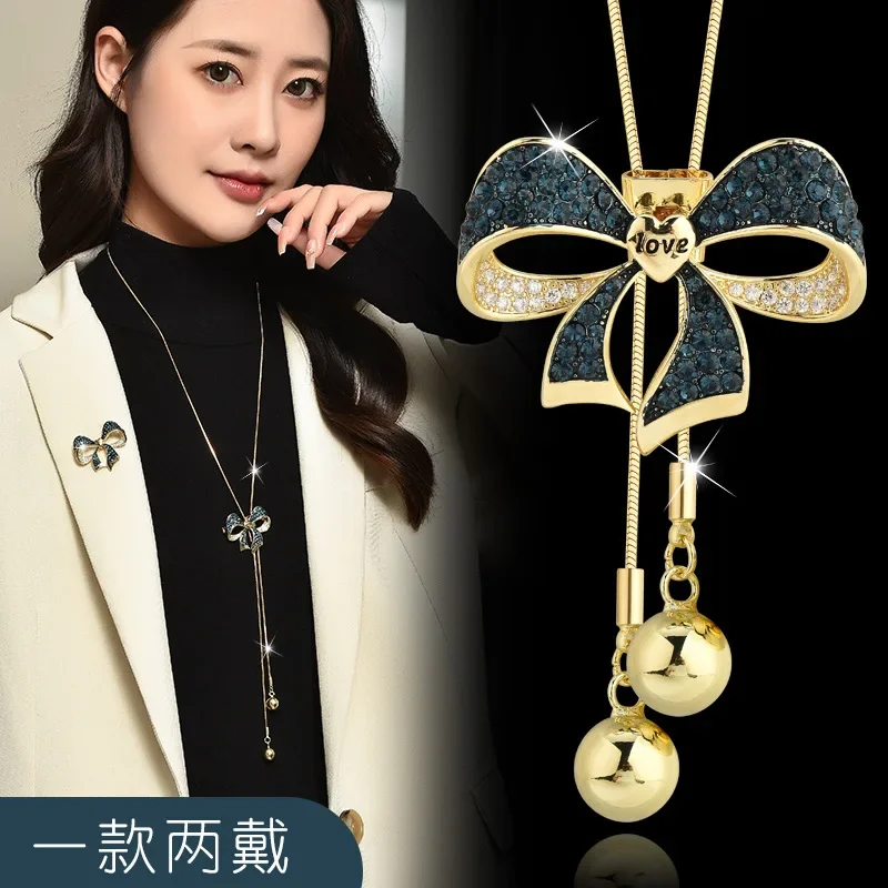 

2025A two-worn autumn and winter versatile bow sweater chain with a fashionable and individual long butterfly corsage