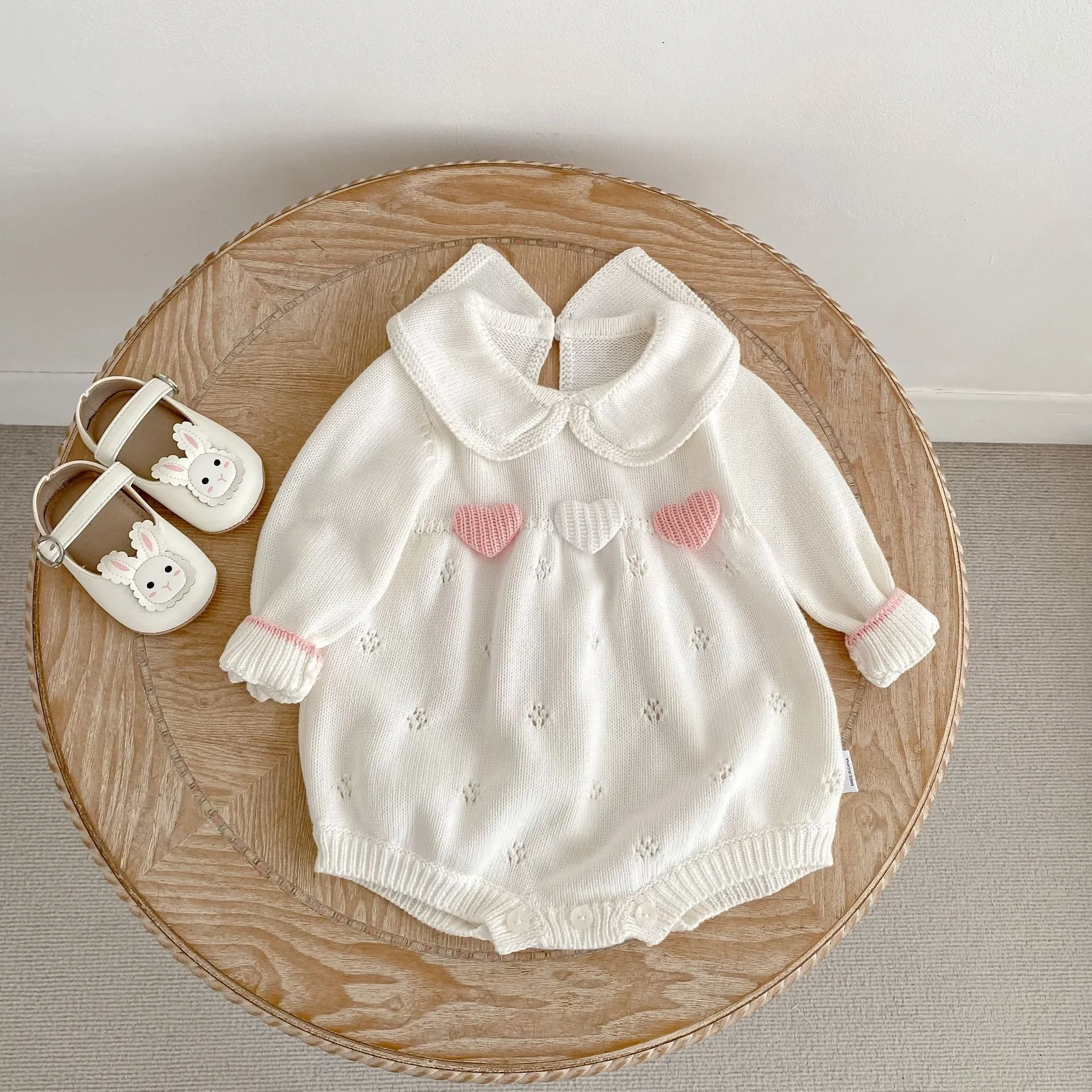 Autumn and winter sweet style lapel with hollowed out embroidery, knitted hoodie, and climbing suit