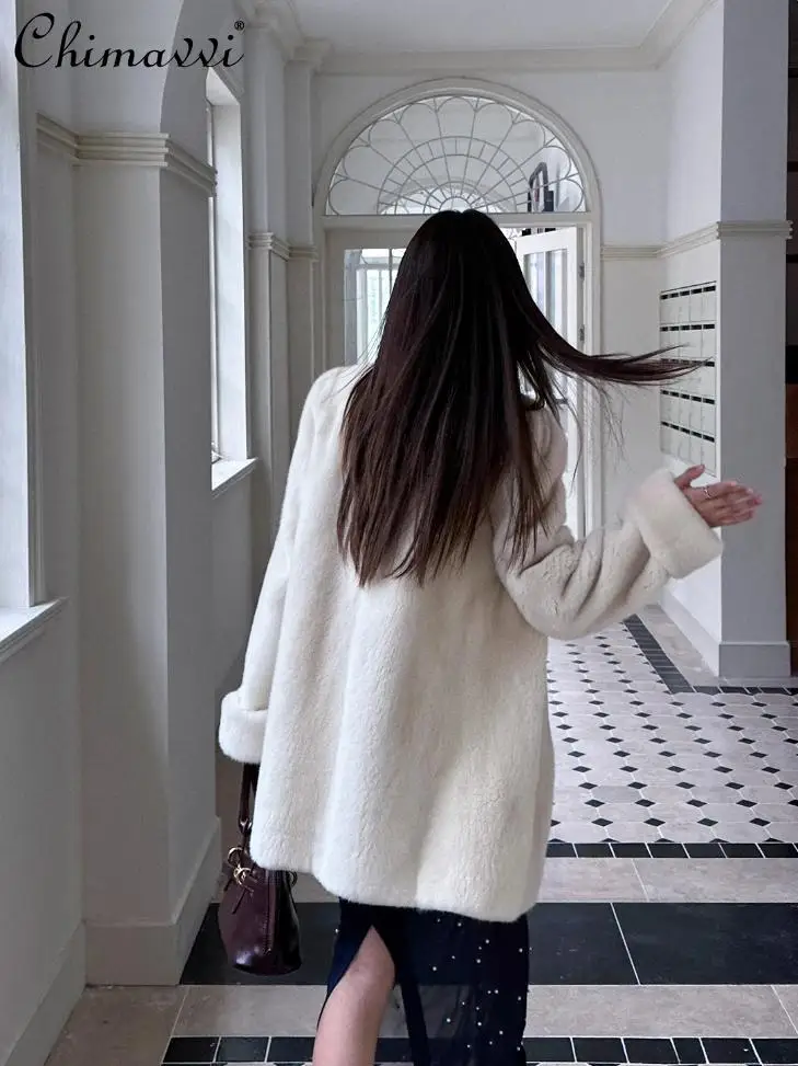 Cappotto in pelliccia di visone imitazione donna inverno moda di fascia alta sciolto caldo a maniche lunghe elegante cappotto integrato in pelliccia femminile di media lunghezza