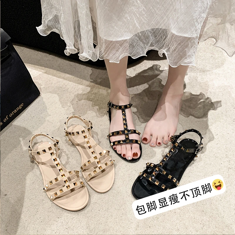 

Luxury Brand Designer Women'S Rivet Sandals Summer Flat Shoes Roman Rivet Sandals Gladiator Sandals Minimalist Style Beach Shoes