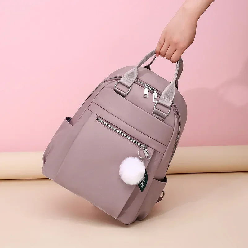 Mochila Oxford de viaje impermeable para mujer, bolso escolar conciso informal, de alta calidad, a la moda