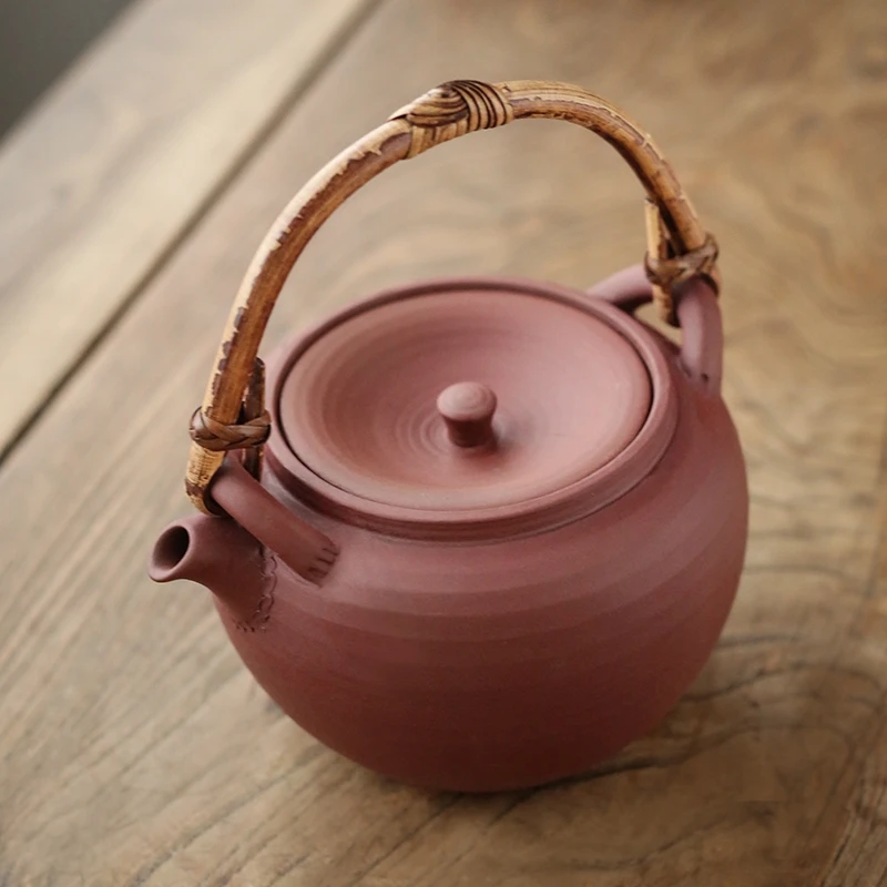 

Vine handle lifting beam pottery clay health preservation boiling tea pot boiling water pot Chinese handmade purple clay pot