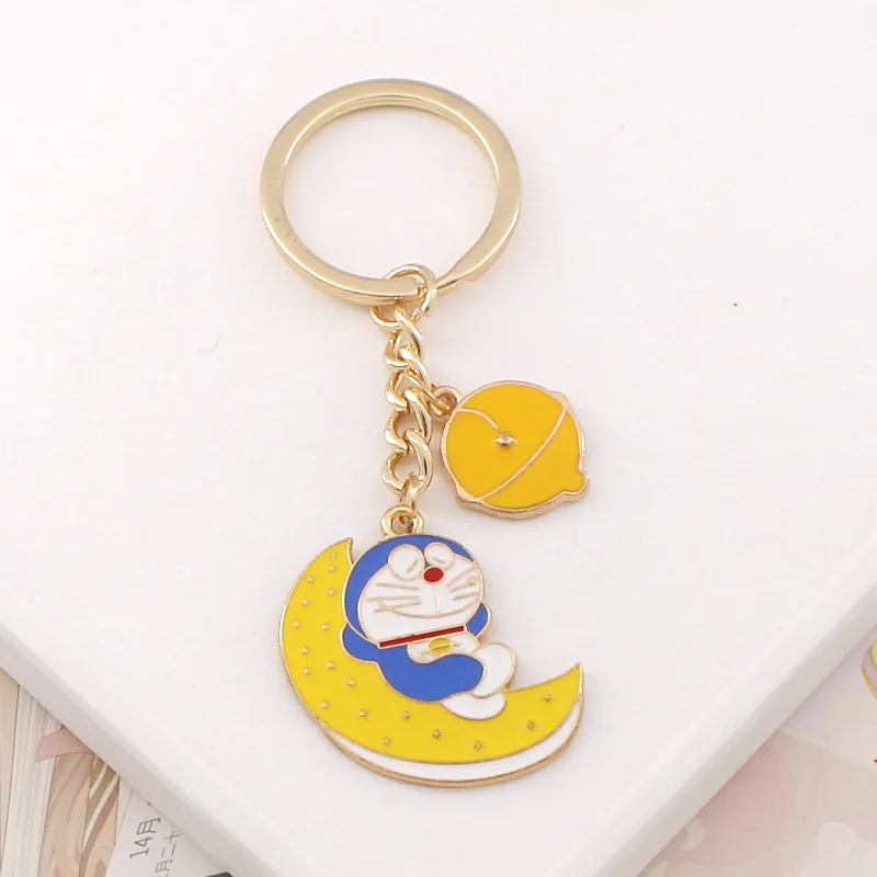 Anime giapponesi Doraemons Kawaii cartone animato portachiavi con motivi anime merchandise zaino fascino piccolo regalo