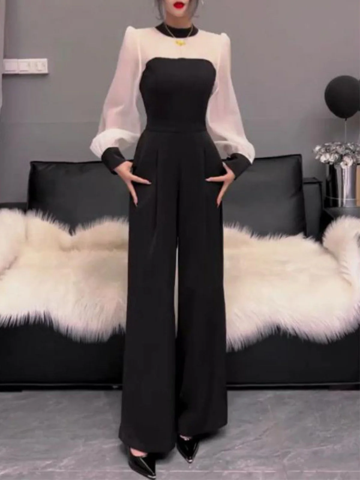 Conjunto de mujer de manga larga casual y a la moda para principios de primavera 2025, que estiliza la figura, con pantalón largo que disimula la silueta, de fibra de poliéster y cuello alto.