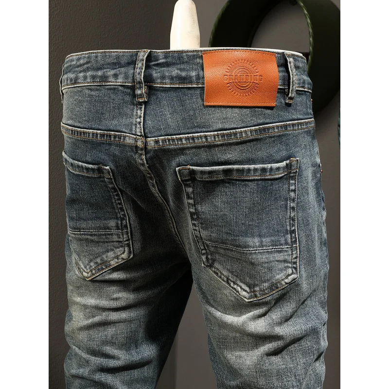 جينز كلاسيكي للرجال قابل للتمدد، رقعة ممزقة عصرية، مقاس نحيف، سراويل طويلة عصرية للقدم الصغيرة