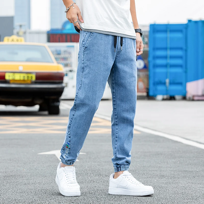 Nowe Duże Rozmiary 8XL Męskie Jeansy Jogger Streetwear Czarne Niebieskie Casualowe Spodnie Cargo Denimowe Elastyczne Bawełniane Spodnie Taper Jeansy Luźne Spodnie