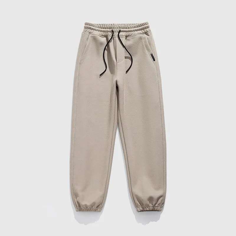 

Мужские трикотажные брюки свободного кроя из смесового хлопка, удобные, осенне-зимние, повседневные, с эластичным поясом, манжетами и вертикальной текстурой, модные