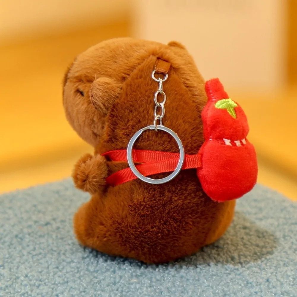 Kawaii Capybara Plush ของเล่น Gourd กระเป๋าเป้สะพายหลังขนาดเล็กจําลองตุ๊กตาน่ารักตุ๊กตาสัตว์อะนิเมะ Fluffty ของเล่นคริสต์มาสของขวัญ