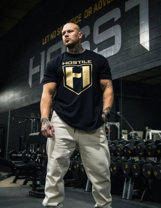 2026 new Gold Shield Emblem Fitness Graphic Print High‑Quality Comfort Loose Gym Short‑Sleeve Tee
