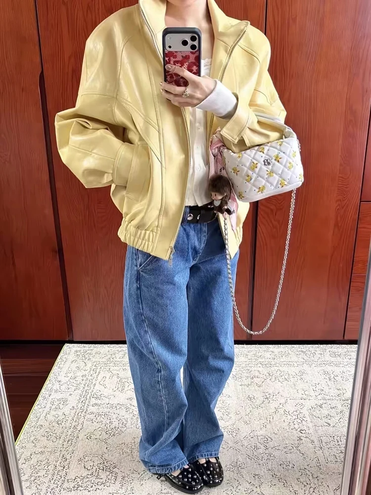 Button-down zipped PU leather jacket with yellow elasticated hem and shoulder sleeves, loose-fitting women's casual retro coat