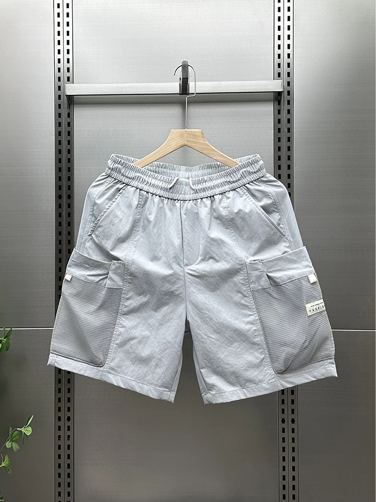 

Уличная мужская рабочая одежда ort Pants Five-ket Qui Dry Sport orts Повседневная свободная посадка Летняя новинка Sle Faionable Молодежная одежда