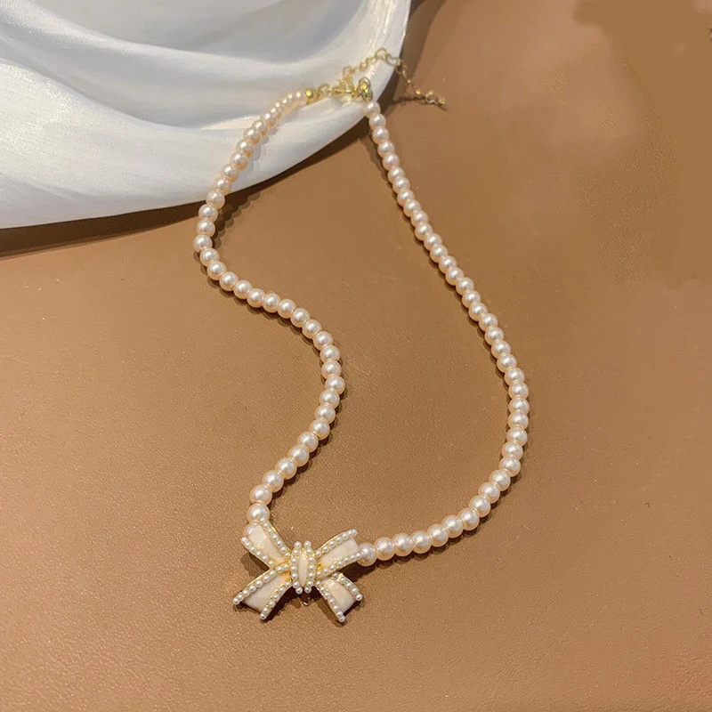 Trend Elegant Jewelry Wedding White Oil Bow Pendant Necklace For Women Fashion White Imitation Pearl Choker Necklace N0430