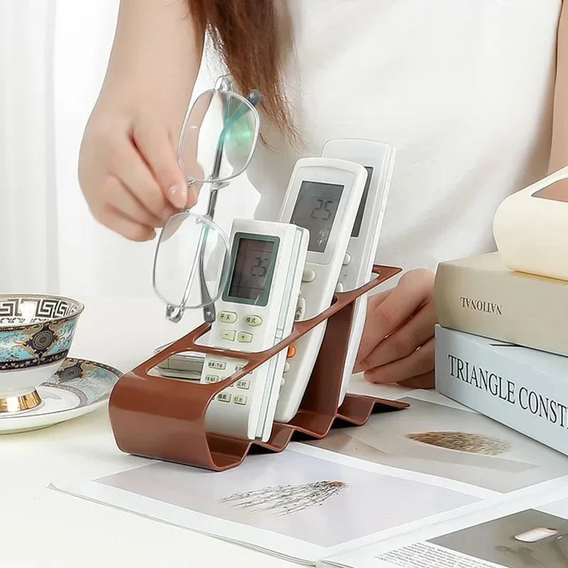 حامل جهاز تحكم عن بعد مكون من 4 فتحات، منظم مكتب بلاستيكي متين، مريح لتوفير المساحة للتلفزيون والمنزل والمكتب، رف تخزين متعدد الأغراض