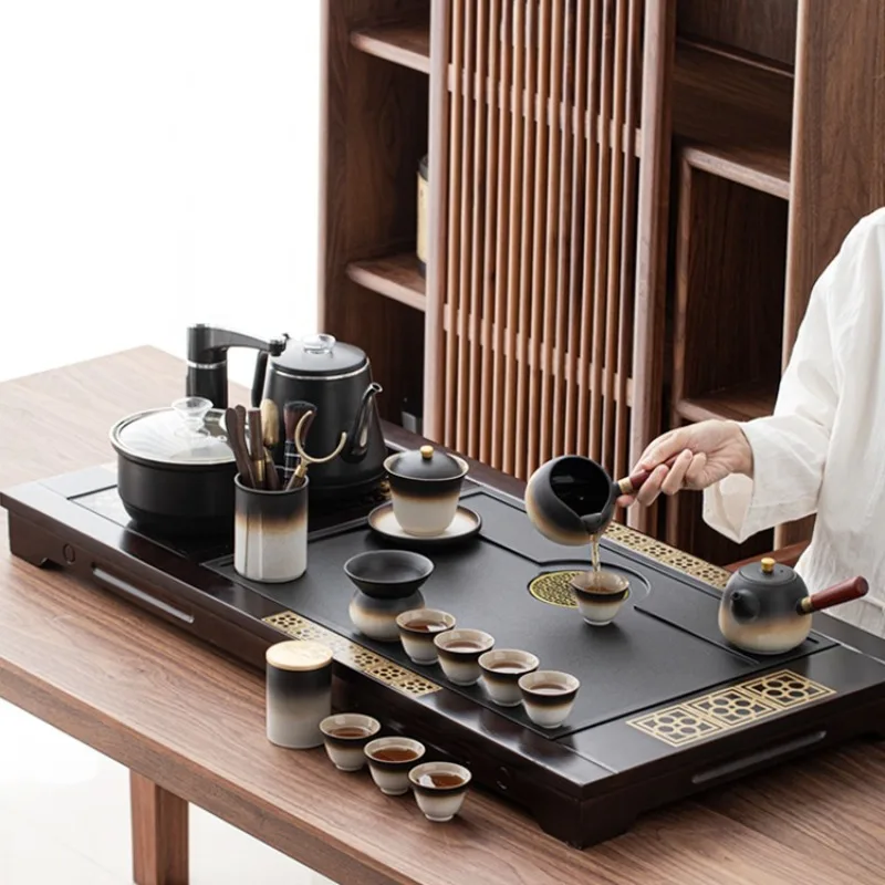 Send a complete set of tea tables for elders, and a new tea tray fully automatic integrated kettle.