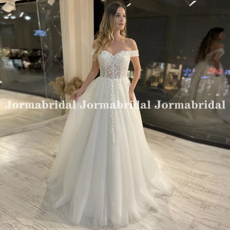 

Delicate Applique Beach Wedding Dresses Off the Shoulder Short Sleeves Bride Dress Illusion Sweetheart Tulle A-Line Bridal Gowns