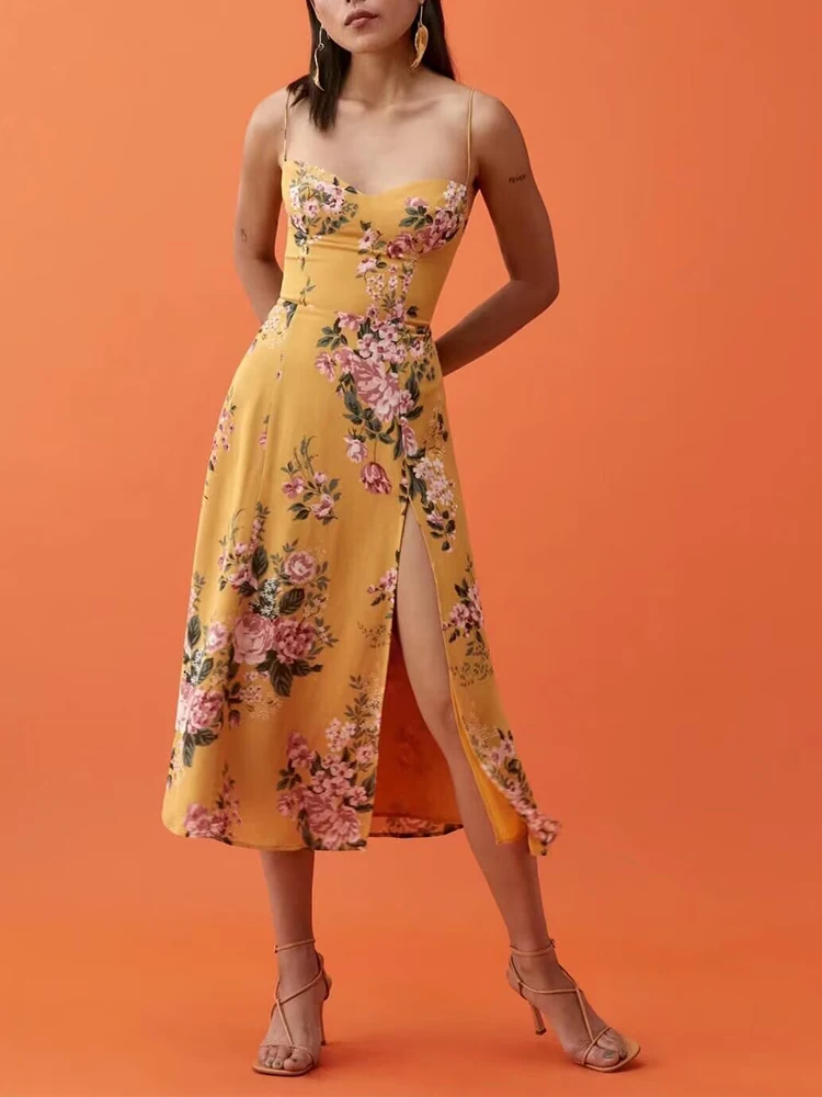 Letnia nowa damska francuska retro sukienka na ramiączkach z kwiatowym nadrukiem, podkreślająca figurę, z rozcięciem, idealna na wakacje.