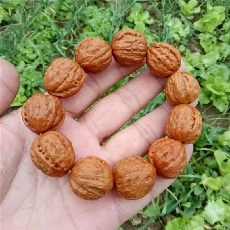 Small-sized handcrafted Buddhist prayer beads eight facets made from autumn peach pits mixed with hemp and walnuts