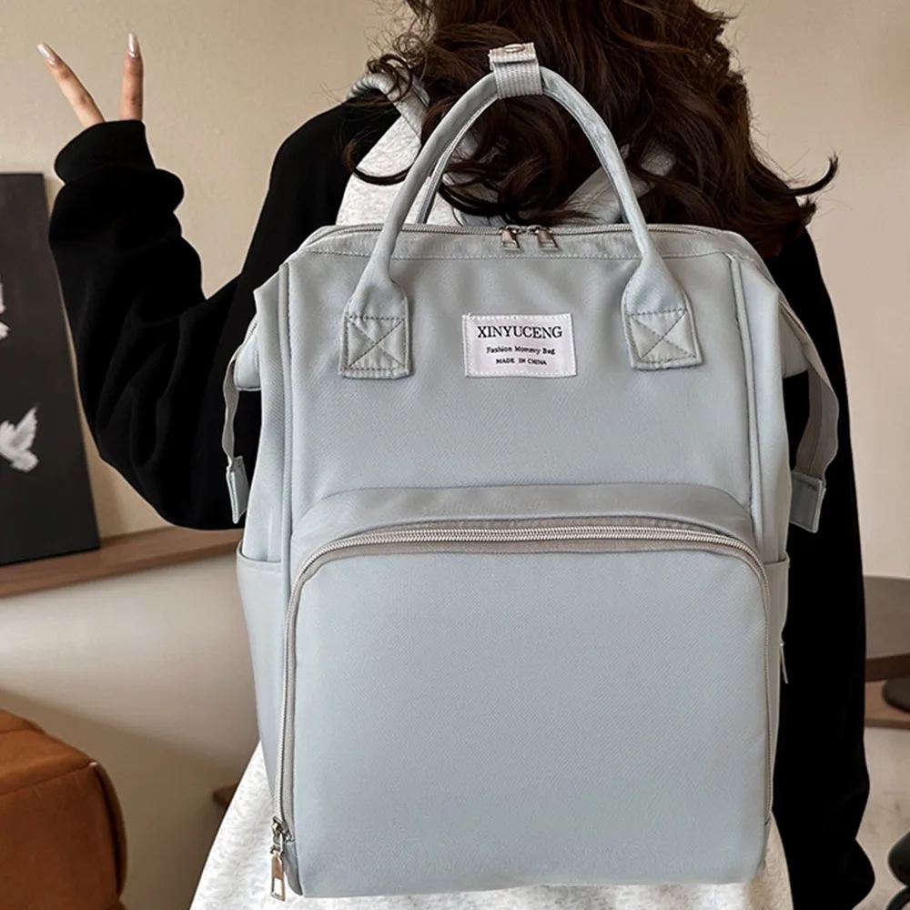 

Multifunctional Mommy Backpack Large Capacity Solid Color Baby Diaper Bag Anti Splash Water Portable Mommy Shoulder Bag Travel