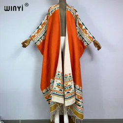 WINYI Winter new cloak Women High Quality poncho tassels Luxury Long Loose OverCoat Thick Warm Female long down coat jacket