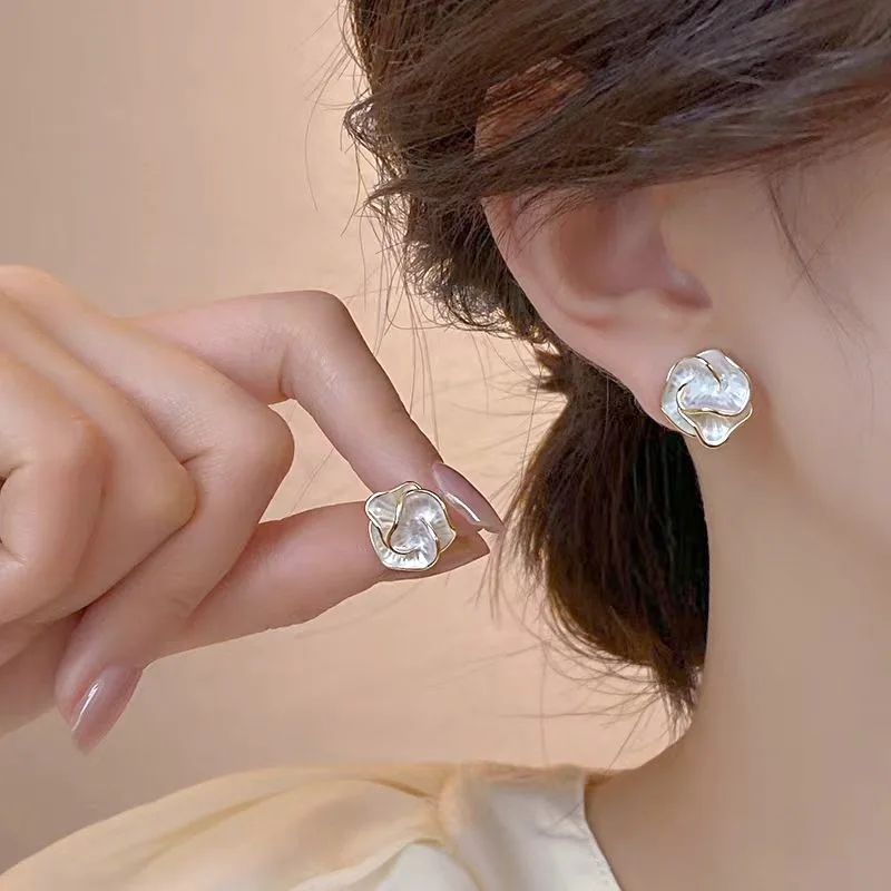 2025 Niche Design Light Luxury Temperament Unique Camellia Stud Earrings For Women Fashion Simple Metal Jewelry Gifts Wholesale