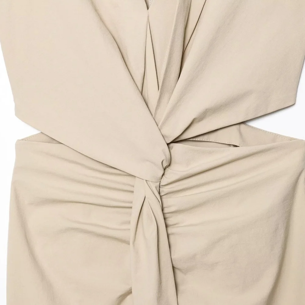 فستان فلوت للتخسيس بعقدة تصميم مفتوح ورقبة على شكل حرف V بدون أكمام بلون سادة وسحاب خلفي صيفي جديد للنساء فستان طويل