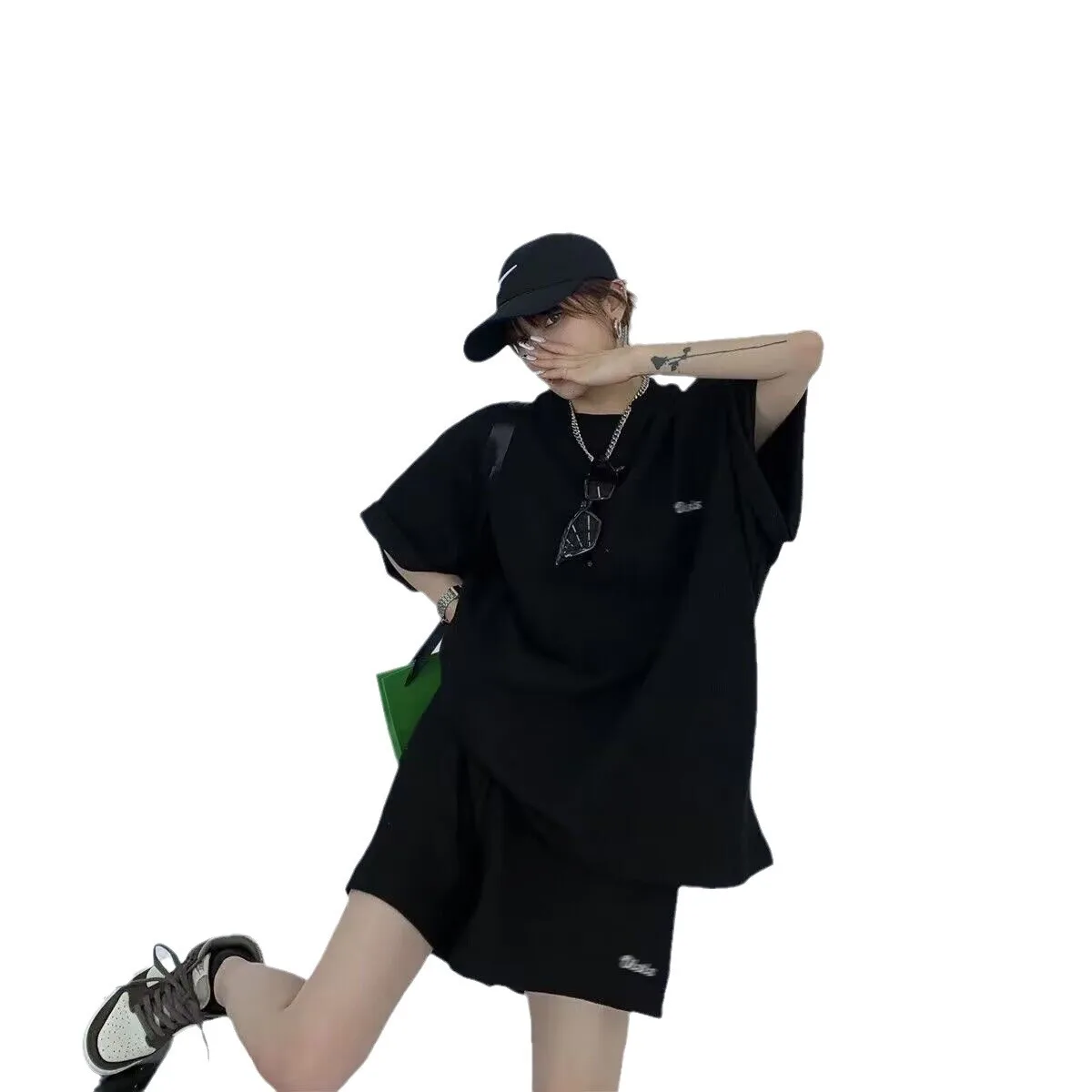 Koreaanse stijl casual sportpak dames zomer nieuwe losse en afslankende T-shirt met korte mouwen shorts modieuze tweedelige set