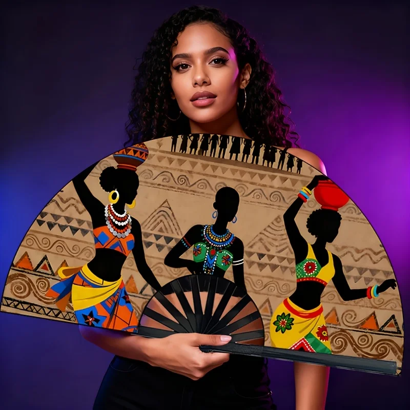 Ladies Holding a Fan Adorned with African Female Dance Art Patterns - a Portable Manual Cooling Fan Suitable for Outdoor, Party, and Festival Occasions.Ladies' Portable Fan, a Fashionable Accessory for Hot Summer and Cultural Atmosphere