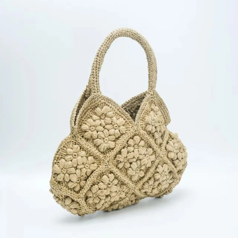 New Handmade Lafite Grass Hollowed Out Woven Flower Petal Pattern Portable Women's Bag Seaside Vacation Fashion Bag Trend