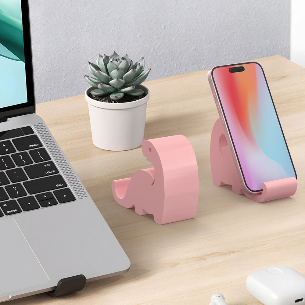 حامل هاتف ديناصور لطيف، مصنوع من البلاستيك، متين وليس من السهل كسر. مناسبة للمكاتب ومكاتب الكمبيوتر وما إلى ذلك.