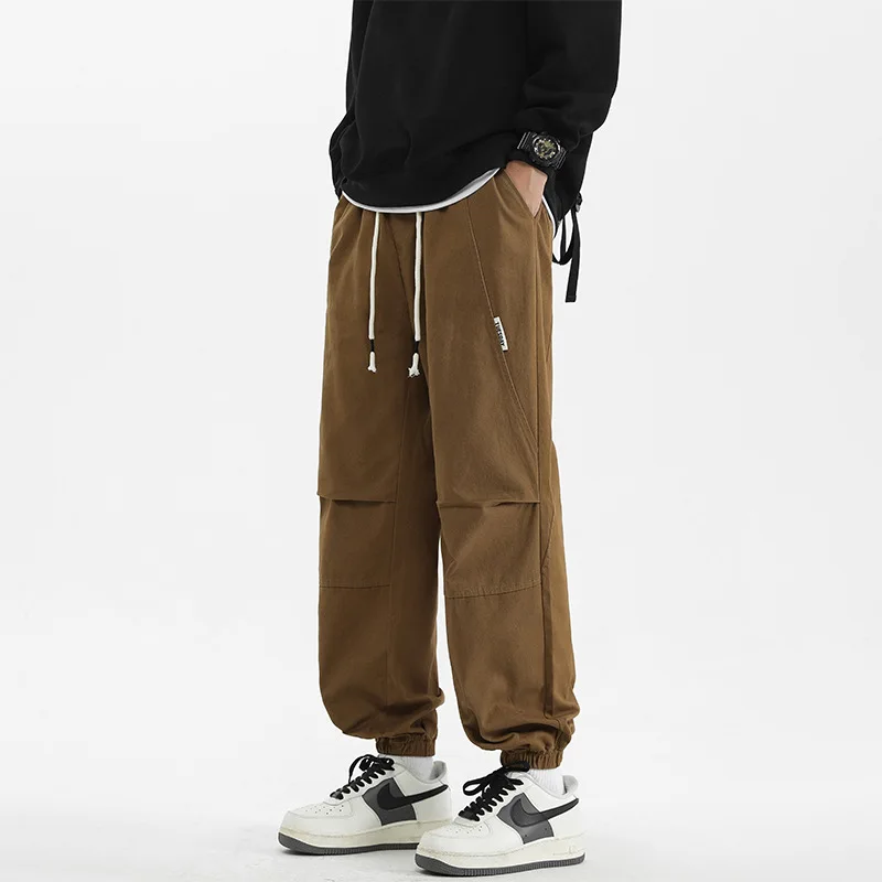 سراويل غير رسمية للرجال مكونة من 9 نقاط ، سراويل الركض الجديدة للربيع والخريف من القطن الخالص لعام 2025 ، سراويل عمل Harun الرياضية فضفاضة والكاحل