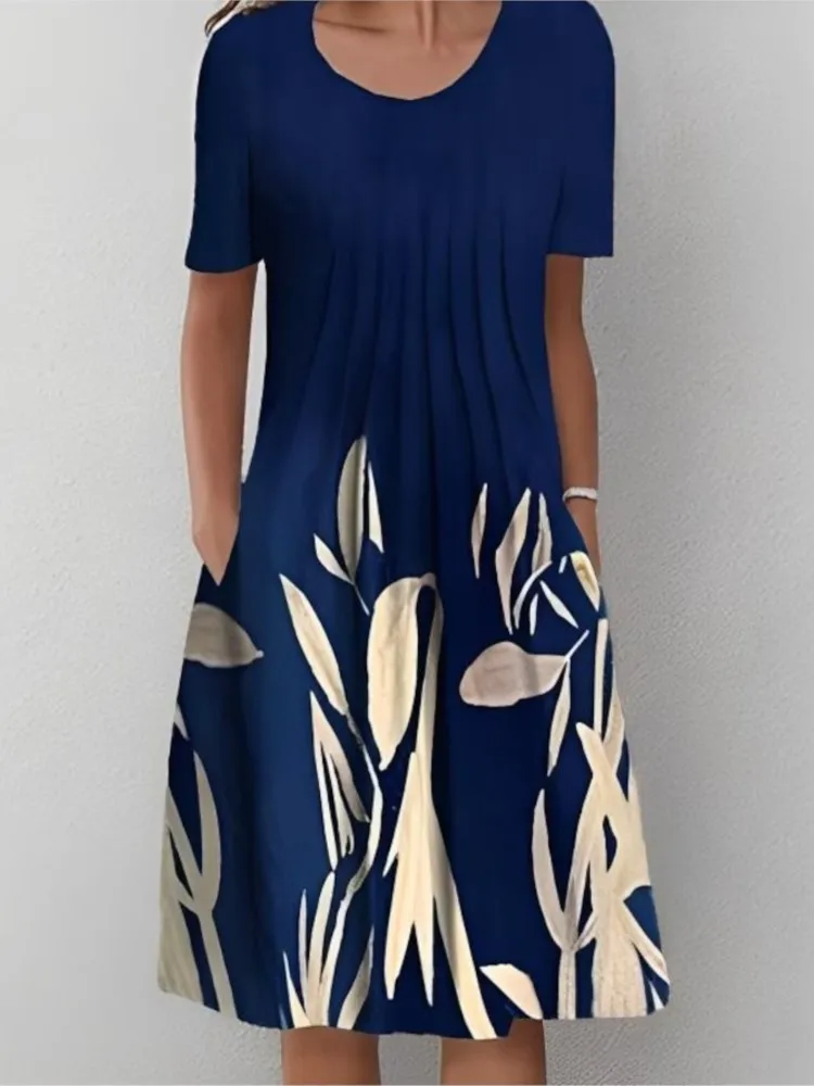 夏のファッション自由奔放に生きる花柄ポケットミディドレス女性のための O ネック半袖カジュアルルーズドレス女性の婦人服