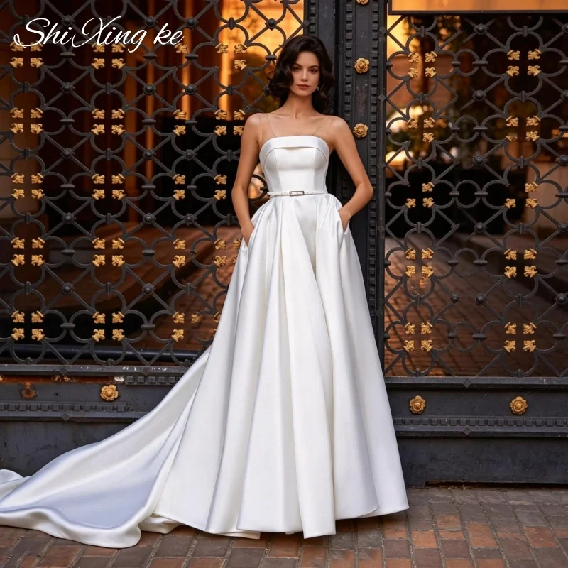 Ballroom A‑Line Bridal Gown Strapless Satin Practical Pockets Court Train Bow Back Customized